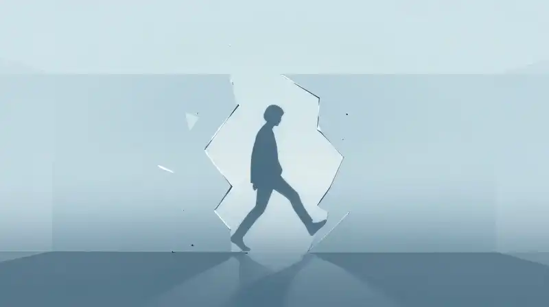 A silhouette steps through broken glass into misty blue light
