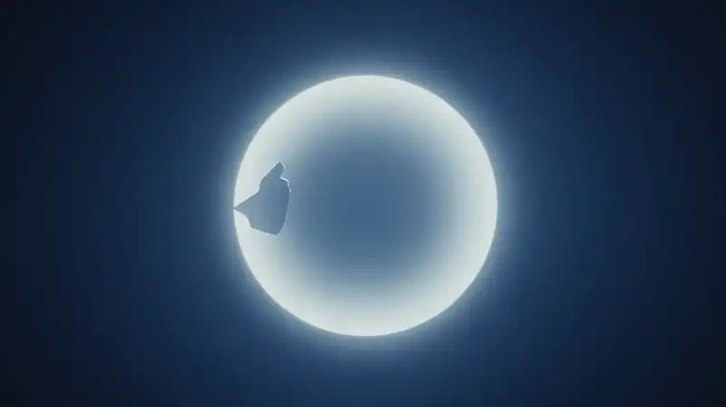A glowing orb slowly fragments into shadows against deep blue