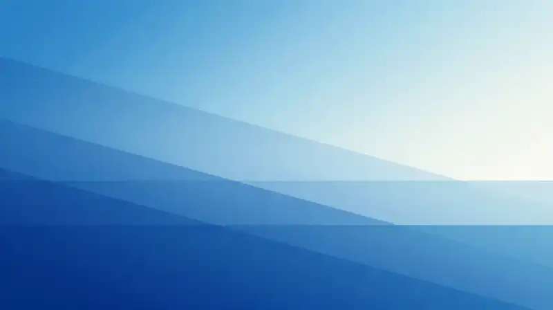 Shifting blue silhouettes fade through a soft, ethereal glow