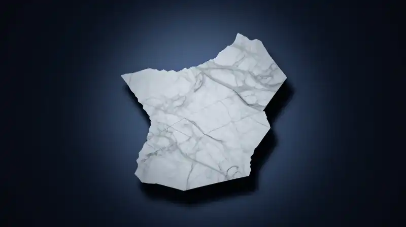 A fragmented marble silhouette with sharp, jagged edges