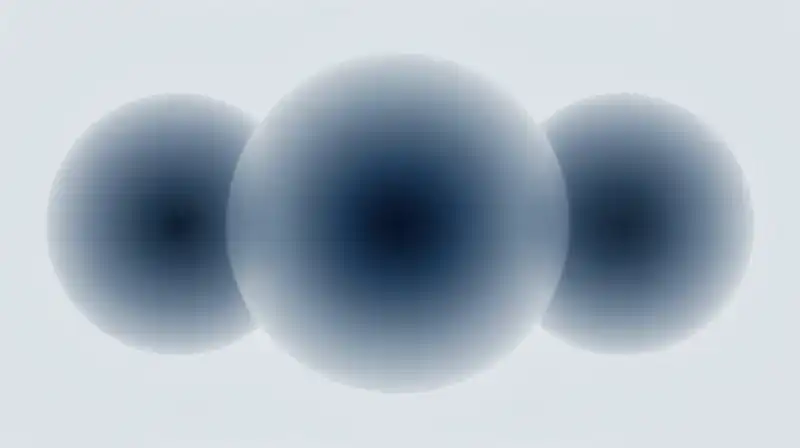 Three translucent blue spheres float within a misty, ethereal void