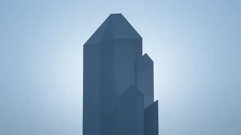 A blue silhouette of interconnected, geometric crystalline fragments
