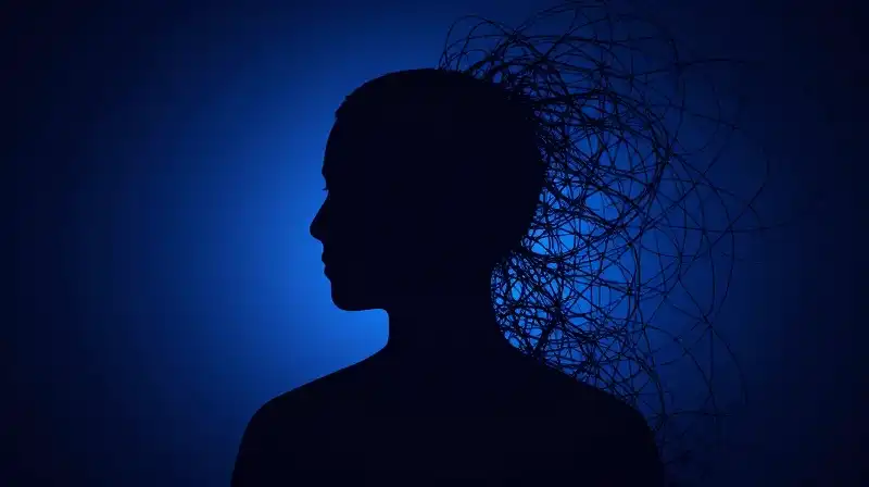 A persons silhouette splits between geometric order and chaotic swirls