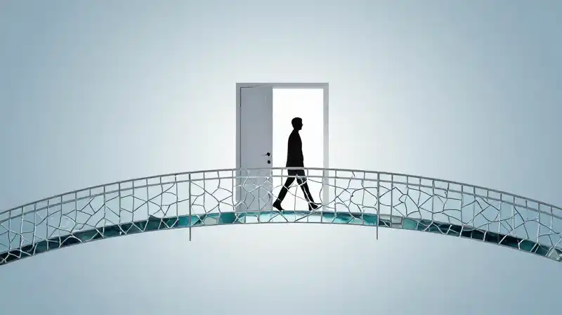 A person walks through a doorway onto a glass bridge
