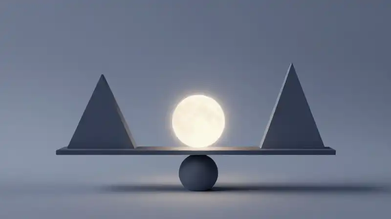 A glowing orb balances atop geometric shapes in soft blue