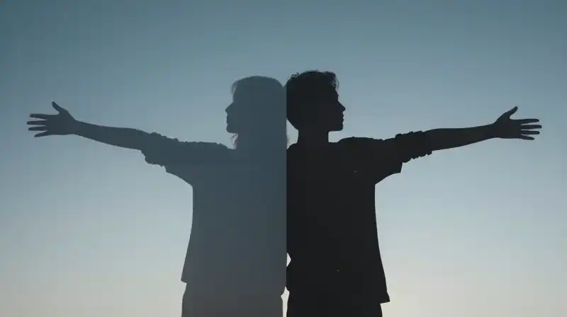 Two silhouettes, one expanding and one shrinking, face each other