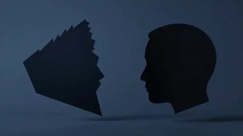 Jagged and smooth silhouettes float among geometric fragments in blue