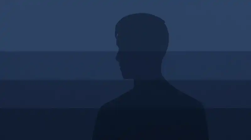A shifting silhouette of fragments dissolves into deep blue mist