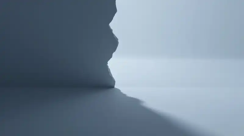 Jagged and smooth shadows split a minimalist blue space