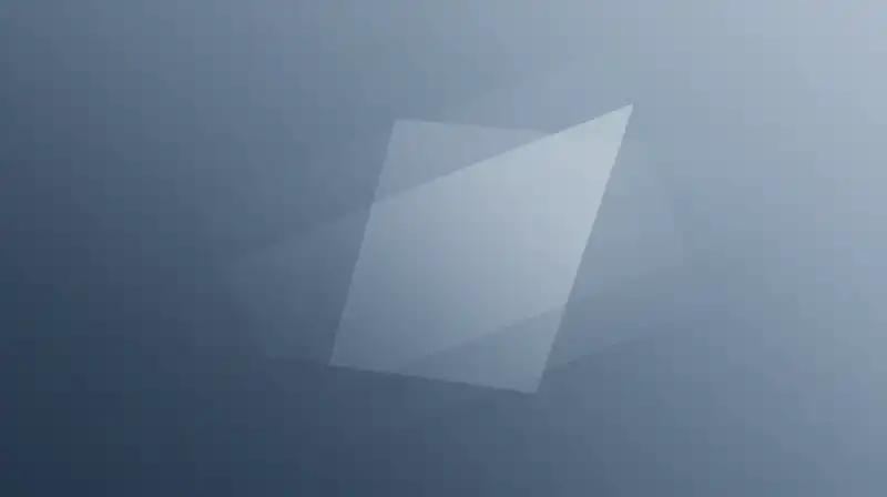Translucent geometric shapes float within a misty, blue void
