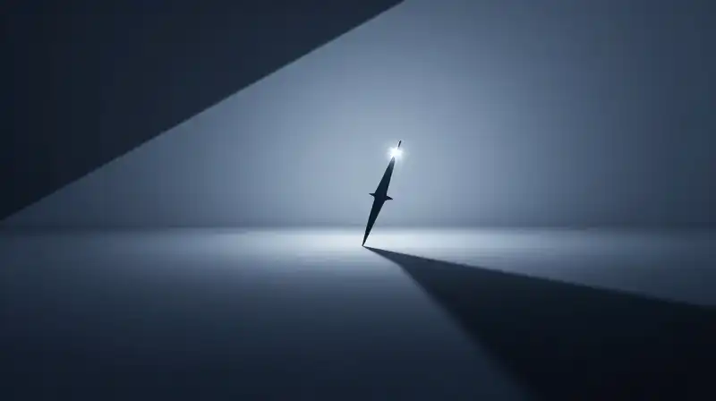 A dark silhouette stands amidst shifting geometric shadows and blue