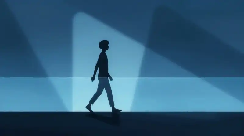 A solitary silhouette steps through light into an ethereal blue
