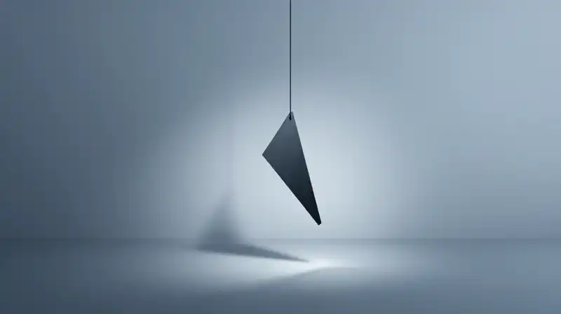 A geometric pendulum swings through a blue, misty landscape