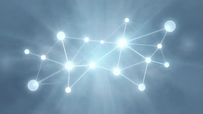 Glowing geometric nodes float within a soft, blue mist