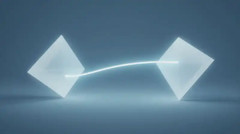A glowing line connects two geometric shapes in blue mist