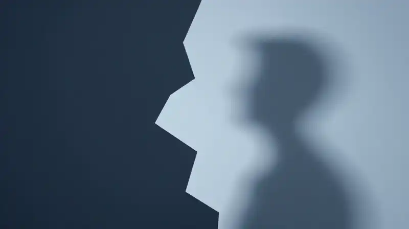 A sharp jagged silhouette contrasts against a soft shadow