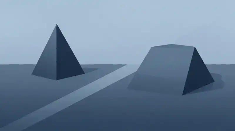 Two distinct geometric shapes diverge amidst a soft blue haze