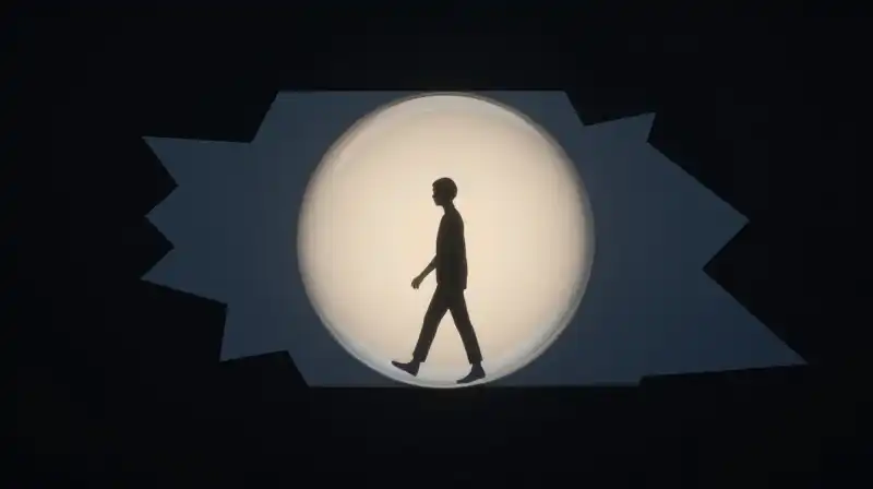 A calm silhouette steps away from shadows toward glowing light