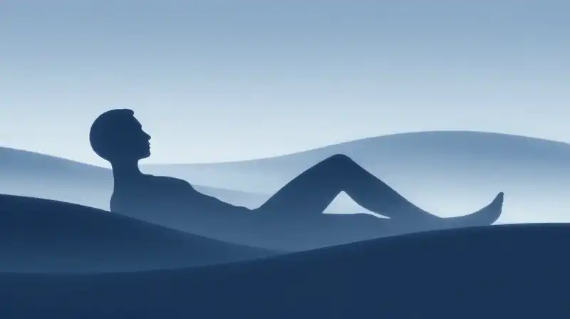A dark silhouette rests amidst flowing blue ethereal waves