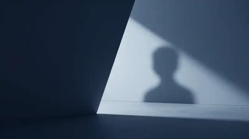 Two contrasting shadows, one sharp and one blurred, meet