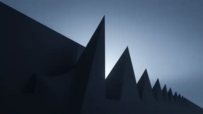 Sharp, jagged geometric shapes clash with soft, creeping shadows