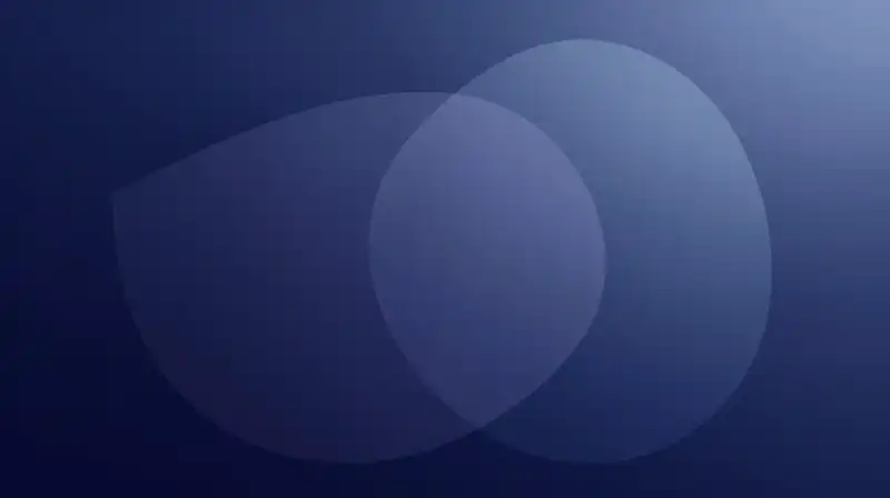 Translucent geometric shapes overlap against a deep indigo background