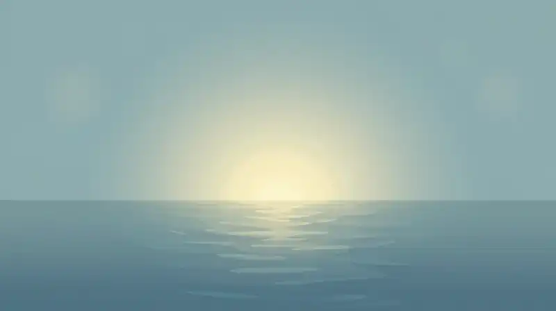 Soft light glows and ripples across calm blue water