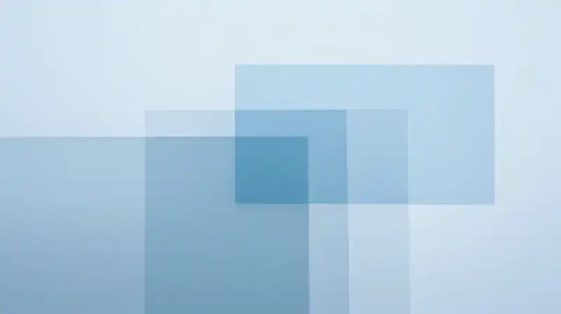 Overlapping translucent glass prisms create ethereal blue geometric silhouettes